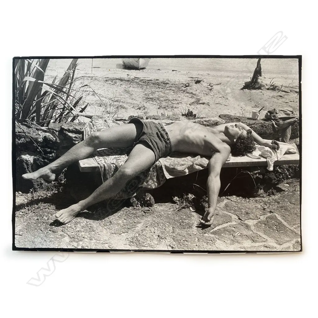 Unidentified photographer - Man sunbathing on bench, c.1975 Image 1++